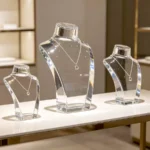 Acrylic necklace bust display with elegant jewelry